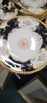 Lot 121 - A Coalport blue batwing tea service and