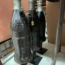 Sold at auction Pair of Painted Cast Iron Coca-Cola Bottle Bottling Plant Fence Posts Auction Number 3360T Lot Number 271 | Skinner Auctioneers