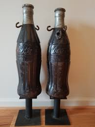 Folk art! PAIR PAINTED CAST IRON COKE BOTTLES