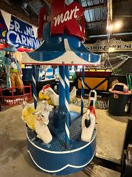 July 25th is National Carousel Day below is some of our carousel pieces including a horse from Bushkill Park and a coin op KMART carousel. July 25 is also my daughter Evie's