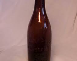 C1910-15 Ropkins & Co. Hartford, Conn., Amber Glass Crown ...