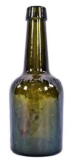 original and intact mid-nineteenth century dark olive green glass long neck porter style bottle.