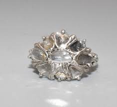Sold at Auction: 14K WHITE GOLD ROSE CUT DIAMOND PEDAL RING.