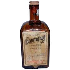 Vintage Empty Amber Cointreau Liqueur Bottle from Newfoundland Air . For Sale at Ruby Lane