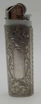 Sold at Auction: "CW" STERLING SILVER LIGHTER CASE HAND ENGRAVED