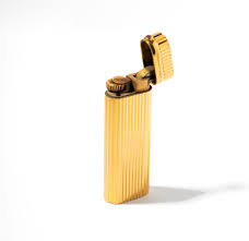 Lot - Cartier Gold Plate and Ruby Lighter