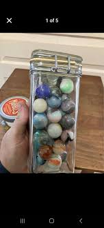 These are clay marbles, anybody know what kind of game this would of been! These are from around 1900. Where a family member game | Facebook