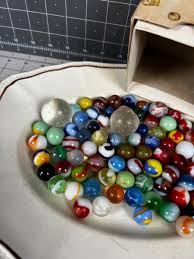 Antique Marbles in Cool old Baby shoe box | EstateSales.org