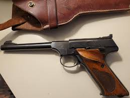 my dad gave me his 1968 colt woodsman. The bluing on the old ...