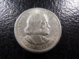 At Auction: **AU/UNC** 1893 Columbian Exposition Silver Half Dollar