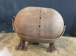 Sold at Auction: Cast Iron Watermelon Hog Oiler