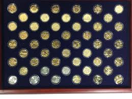 Sold at Auction: (2) The Morgan Mint U.S. State Quarter Sets