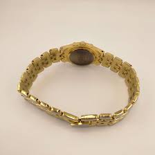 Seiko Women's Gold Tone Watch, Round Dial, Crystal Dot Hour ...