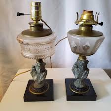 2 Antique Oil Lamps Female Bust Spelter Metal Black & Brass Base Glass Chamber · Whatnot: Shop, Sell, Connect