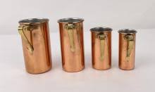 Sold at Auction: COLLECTION OF GRADUATED COPPER MEASURING CUPS