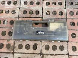 FISHING ROD AND REELS, NET AND COOLER | EstateSales.org