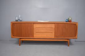 Long low teak sideboard in vintage teak with sliding doors ...