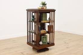 Spinning Antique Walnut Revolving Chairside Bookcase