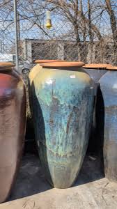 We've been busy organizing last week's shipment of our rustic collection. Everything is now on display and the yard is completely stocked! The rustic pots come in many different color variations, and