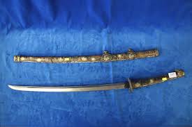Sold at Auction: JAPANESE SAMURAI STYLE SWORD SIGNED SCABBARD ENGRAVED DECORATION INCL HORSES