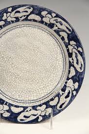 Lot - (4) DEDHAM POTTERY PLATES - Vintage 1900 Arts & Crafts Plates, including: 8 3/4" rabbit edged; 8 1/2" rabbit edged; 8 3/8" tree edged, 5 3/4" iris edged, all in good condition