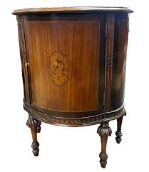 Sold at Auction: Small Mahagony Demilune Cabinet.