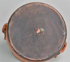 Sold at Auction: (2) pcs Greg Shooner Glazed Redware Pottery, straight sided crock with handles, 1993, 6 3/4" d, 5 3/4" h small sgraffito deer tray, ...