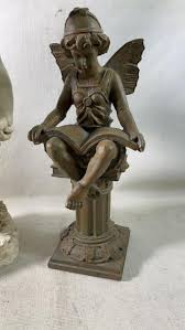 Sold at Auction: Vintage Resin Garden Statue & Fairy Reading ...