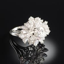 Lot - A PLATINUM AND DIAMOND LADY'S DINNER RING,