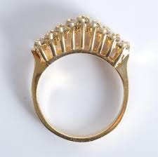 Sold at Auction: 14K Yellow Gold Ring w/over 27 Diamonds