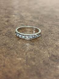 Is this 14K white gold? And do the diamonds look real? : r ...