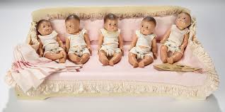 Dionne Quintuplets" Presented in the Earliest-Model Bed, 1935