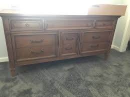 Sold at Auction: Dixie Fruitwood 9 Drawer Dresser w/ Mirror
