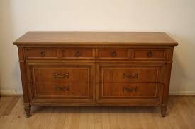 Lot #19: Vintage Thomasville Solid Oak Dresser with Original Hardware | EstateSales.org
