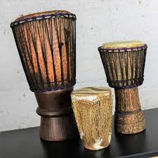 Trio of Tribal Drums Carved Wood and Animal Hide For Sale at 1stDibs | animal drums, animal hide drum, animal skin drum