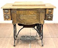 Sold at Auction: Antique Domestic Iron Oak Sewing Machine On Wheels