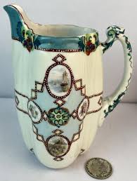 Sold at Auction: Antique Nippon Shubei Kate Hand Painted Porcelain Chocolate Pot