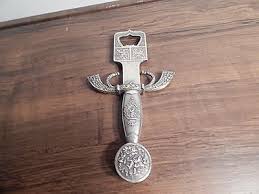 MAGNIFICENT LION AND CASTLES METAL BOTTLE OPENER ...