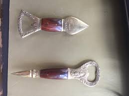 Brass bottle openers and pointy ends, mahogany or walnut ...