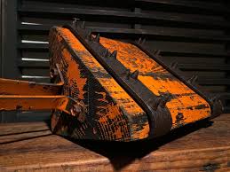 Vintage Bell System Wheel Chock. Painted wood, with cast iron spiked bands. Somehow these pieces keep finding me, and couldn't be more thrilled with this one. Simply beautiful color and patina, and