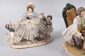 Lot - A Collection of Four German "Dresden Lace" Figure Groups
