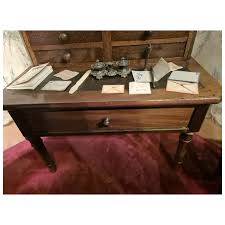 Very charming mahogany writing desk with its black wooden chair for . For Sale at Ruby Lane