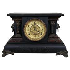 Antique E. Ingraham Chiming 8 Day Ebonized Faux Marble Lion Mantel Clock at 1stDibs