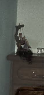 Hello! Not sure if allowed. But I'm trying to identify this statue. This is something very meaningful to my mom. Unfortunately this is the only picture I have of it. It's is