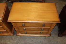 Sold at Auction: Pair of Tommy Bahama oversized 3 drawer nightstands in a light mahogany finish with pineapple style legs and faux bamboo style columns