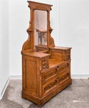 Sold at Auction: WASH STAND/DRESSER - Antique American Eastlake elm with tall back, built-on candle stands flanking rectangular mirror over two doubl...