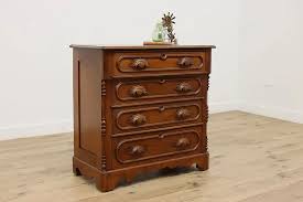Victorian Carved Walnut Antique Four Drawer Dresser or Chest