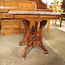 Sold at Auction: Antique Victorian walnut Tennessee brown marble top lamp table, marble has been repaired long ago approx. 33" w x 23" d x 31" h