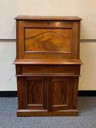 Lot - Victorian Walnut Slant Front Desk 46 x 30 x 17 1/4 in. (116.8 x 76.2 x 43.8 cm.)