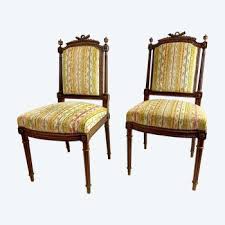 Pair of Louis XVI style chairs with torches - C... | Antikeo